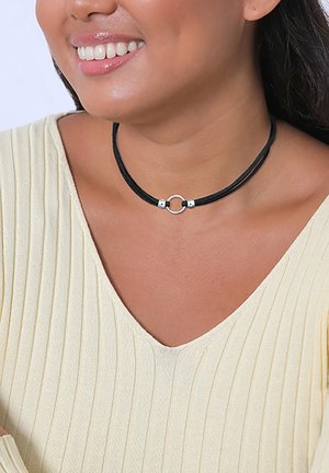 Black choker necklace with multiple strands, featuring a central silver circular ring and silver accents on the strands.