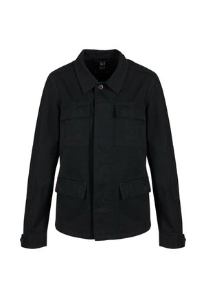 Jachetă din bumbac neagră, cu guler, două buzunare pe piept și două buzunare laterale. Dispune de închideri cu nasturi și un design lejer.