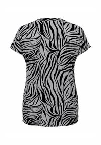 Svart- och vitrandig zebraprint t-shirt med kort ärm, avslappnad passform och rundad halsringning, med ett flödande tyg och rundad nederkant.