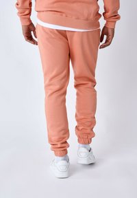 Project X Paris Pantalones deportivos - orange cuivre