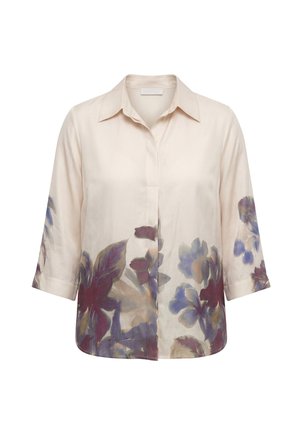 Cream-colored, button-up blouse with 3/4 sleeves, featuring large purple, blue, and maroon floral prints along the lower front and sleeves.