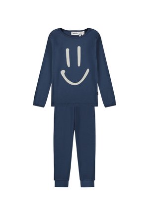Navyblåt børne-pyjamasæt med langærmet top og matchende bukser med et stort hvidt smilende ansigt på forsiden af skjorten.