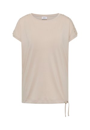 Béžová krátký rukáv halenka s nařasenými detaily na rukávech a malou nastavitelnou mašlí na pravém spodním lemu.