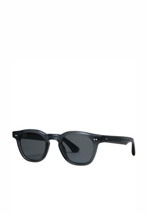 Black plastic sunglasses with rectangular lenses, featuring a slightly curved shape, two small silver dots near the hinges, and a glossy finish.