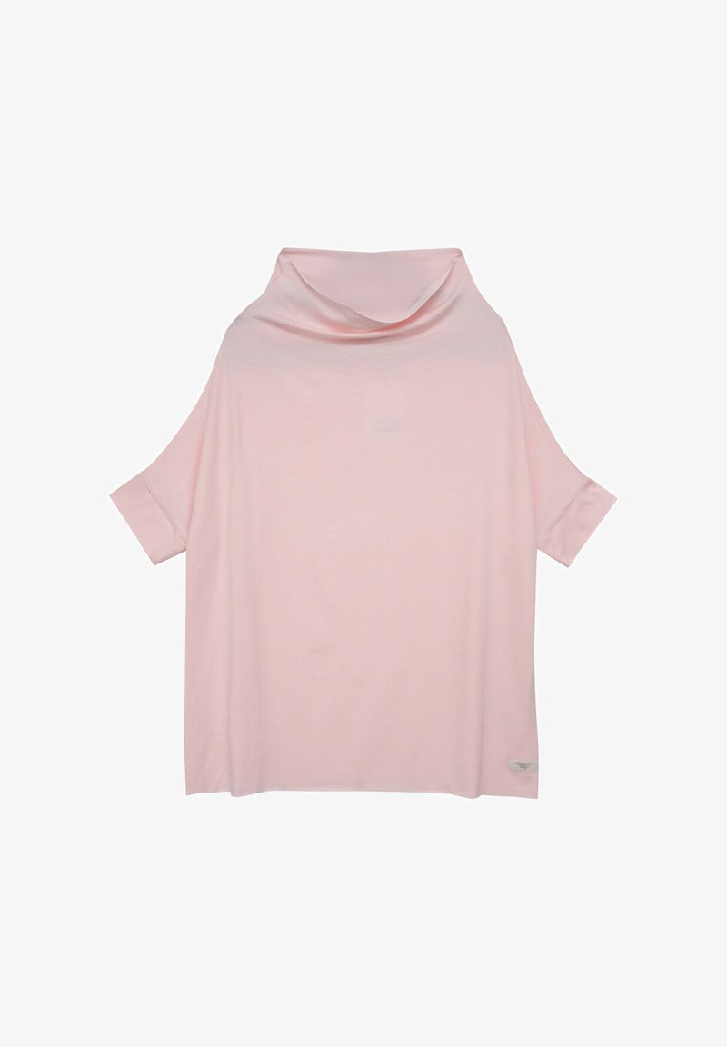 Różowa oversize'owa bluzka z dekoltem w serek, krótkimi rękawami i gładką fakturą materiału. Charakteryzuje się subtelnie umieszczoną metką marki na dolnej stronie.