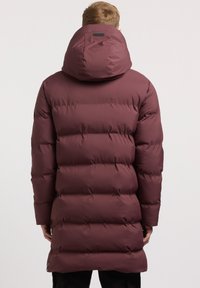 Maroon puffer coat with a hood, featuring quilted sections for insulation. Smooth, shiny fabric with a slightly glossy finish.