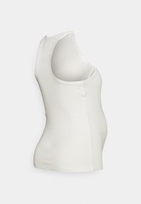 Camisola branca sem mangas feita de algodão elástico. Apresenta um design ajustado, decote redondo e textura suave.
