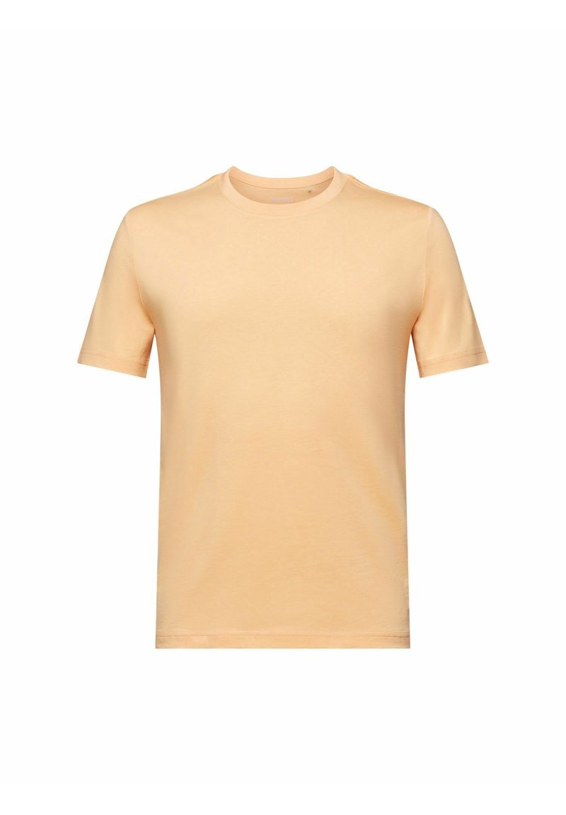 Einfache T-Shirt mit kurzen Ärmeln und Rundhalsausschnitt in hellpfirsichfarben, auf einem weißen Hintergrund präsentiert.