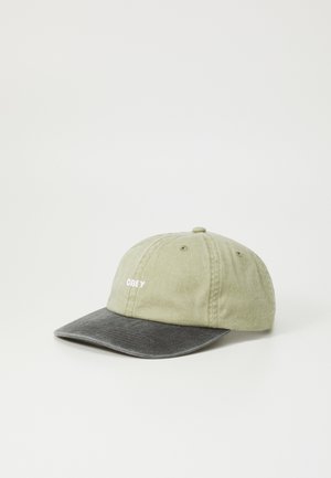 Olive green cotton cap with a darker gray visor. Features embroidered "OBEY" logo in white on the front. Structured design with eyelets.