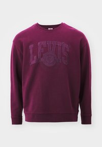 Sudadera de algodón color marrón con cuello redondo, mangas largas y logo LEVI'S en relieve con un emblema circular en la parte frontal.