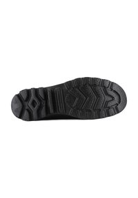 Soletta di scarpa in gomma nera con un motivo di battistrada robusto, caratterizzato da profonde scanalature, creste e una finitura strutturata per aderenza e durata.