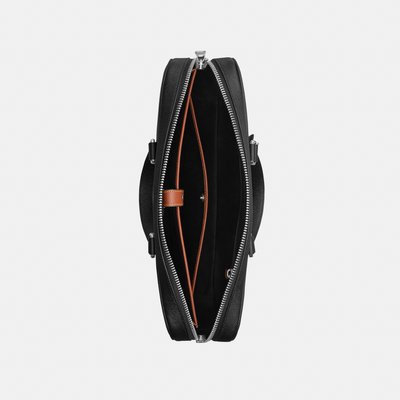 Malette en cuir noir avec fermeture éclair argentée ouverte, montrant l'intérieur avec une finition en cuir marron et plusieurs compartiments.