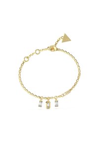 Bracciale in oro con tre ciondoli in cristallo trasparente e un'etichetta con marchio. Maglie semplici con chiusura a moschettone e lunghezza regolabile.