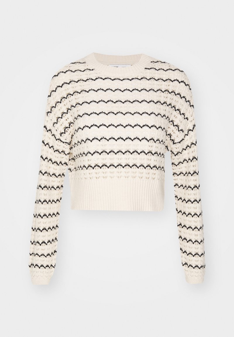 Pull en maille crème avec des rayures horizontales ondulées noires, manches longues, col rond et ceinture côtelée.