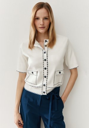 STYLISHE KURZARM ZIERNÄHTE - Gilet - offwhite