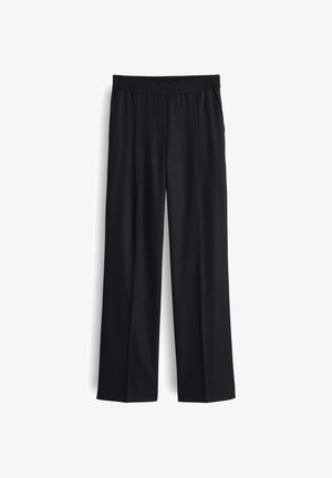 Schwarze weit geschnittene Hosen mit einer glatten Textur, elastischem Bund und Seitentaschen, die ein Ganzkörperdesign aufweisen und für verschiedene Anlässe geeignet sind.