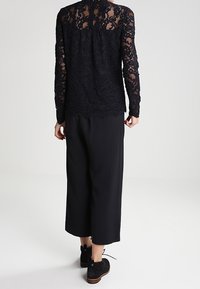 Cream Blouse - black