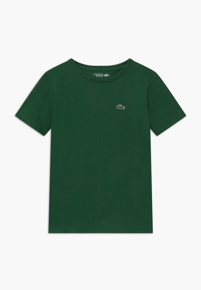 T-shirt en coton vert à manches courtes, col rond, avec un petit logo brodé sur la poitrine gauche. Texture lisse et design simple.
