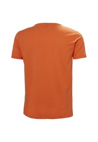 Tričko s krátkým rukávem v oranžové barvě, vyrobené z hladké bavlněné látky, s jednoduchým kulatým výstřihem a rovně střiženým lemem.