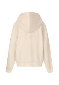 Helle beige Kapuzenjacke aus weichem Stoff, mit einer großen Kapuze, langen Ärmeln und strukturierten Nähten mit subtiler Stickerei "new bad habits".