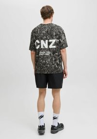 Jack & Jones Performance JCOCNZ BERLIN  - Camiseta estampada - black