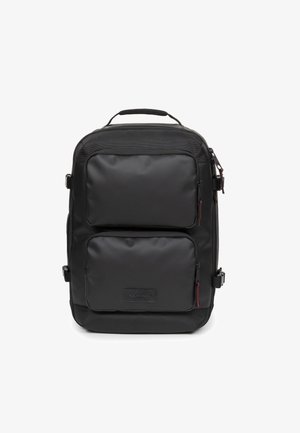 Black backpack with two front zippered pockets, durable fabric, padded back, and top handle. Features red zipper accents and logo patch.