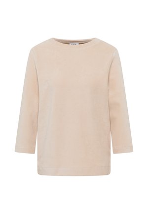 Chemise en velours côtelé beige à manches longues avec un col rond et un ourlet droit, présentée sur fond blanc.