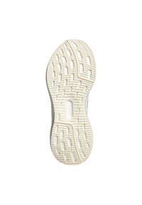 Witte sneakerzool met een gestructureerd grip patroon, rechthoekige groeven en een lichte kromming. Glad aan de zijkanten met subtiele merktekens.