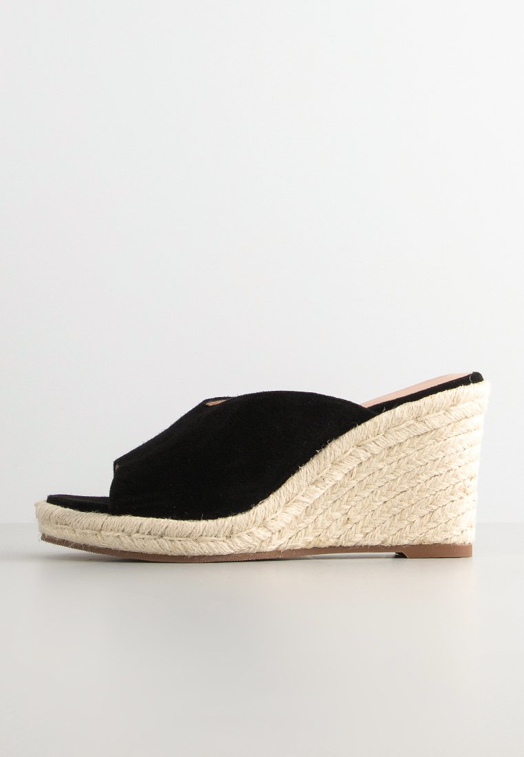 Mules de tacón