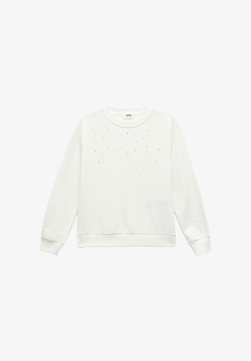 Witte lange mouwen crewneck sweatshirt met kleine verspreide zwarte rhinestone versieringen over de borst, geribbelde manchetten en zoom.