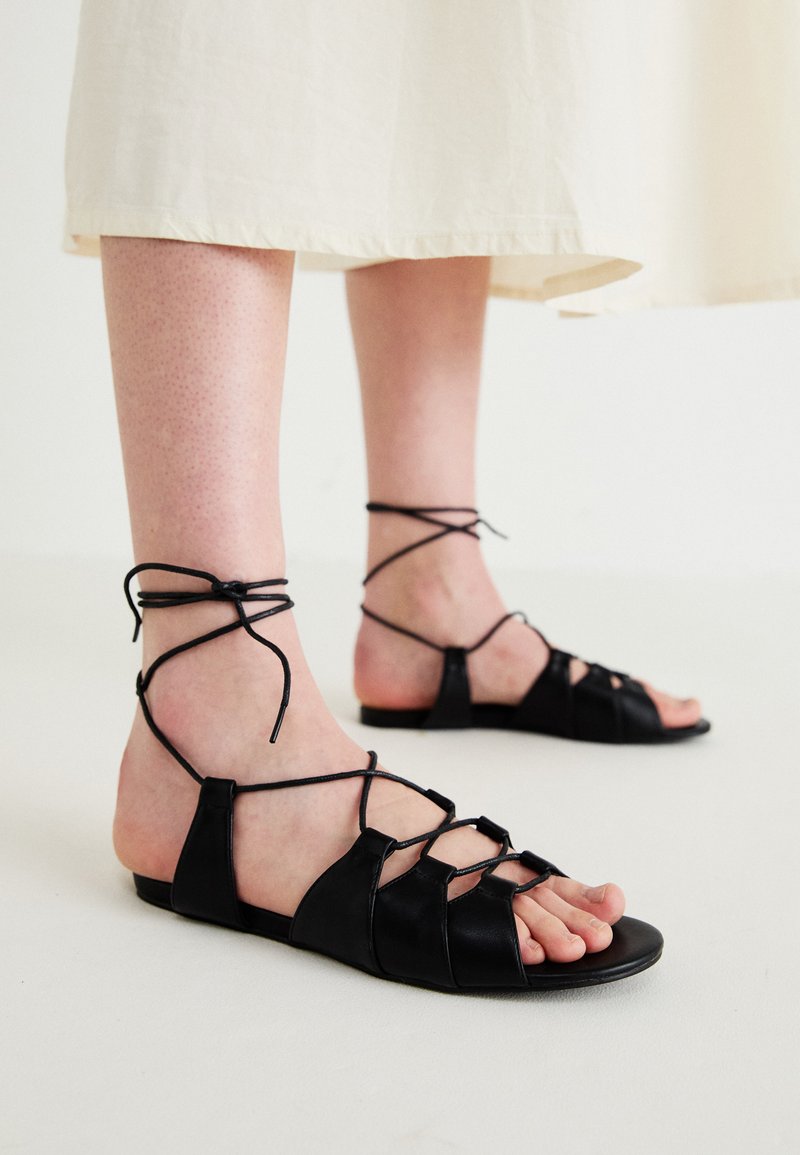 Raid Sandalen met enkelbandjes zwart