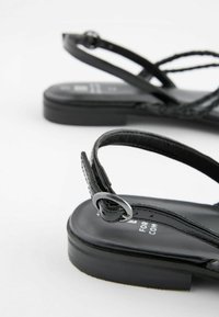 Next FOREVER COMFORTÂ® LEATHER FLAT TUBULAR PLAITED SANDALS - Sandalen - black
