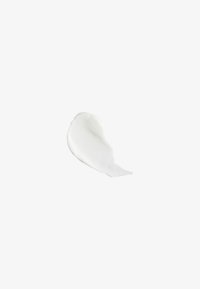 White cream-like substance with a smooth, glossy texture, shaped in a curved, thin smear against a plain background.