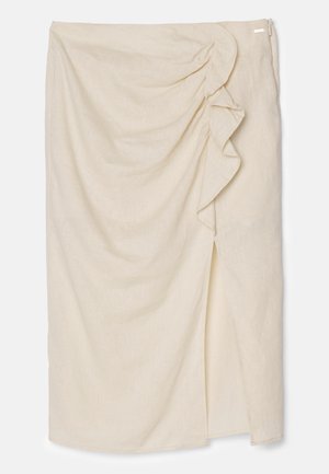 Beige linneskjørt med drapert stoffdetalj og sidesliss. Har en volangdetalj på venstre side og en diskret glidelås.