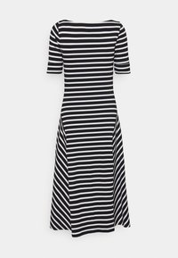 Black and white striped dress with a fitted bodice, short sleeves, and a flared skirt extending below the knee. Smooth fabric texture.