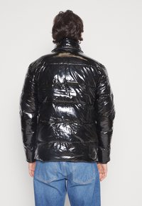 Ellesse TREVANI - Žieminė striukė - black