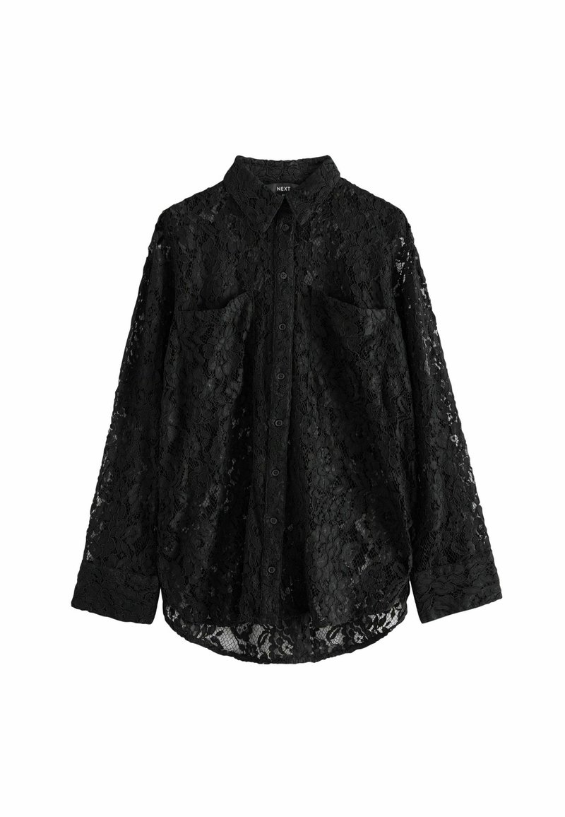 Black lace blouse with a button-up front, long sleeves, two chest pockets, and a curved hem. The lace features a floral pattern.