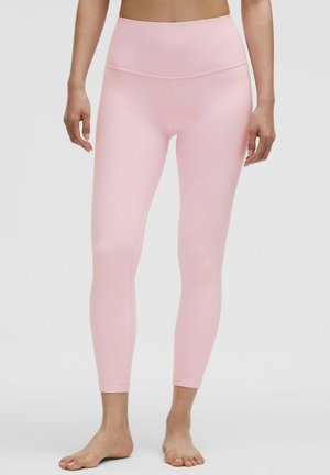 Pink leggings with a high waist, made from a smooth, stretchy fabric, featuring a form-fitting design and ankle-length cut.