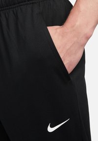 Nike Performance - Spodnie treningowe