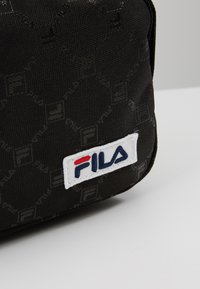 Fila MINI STRAP BACKPACK VARBERG - Sac à dos - black