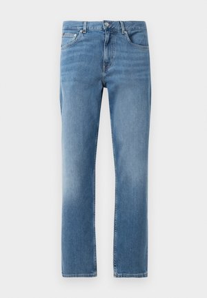 Lyseblå denimjeans med lige ben, fem lommer og lukning med metalknap foran. Synlig falmning på lår og bund.
