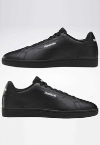 Černé tenisky Reebok s hladkým koženým svrškem, nízkým střihem, kulatou špičkou a minimalistickým vzhledem s decentními švy.
