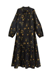 Zwarte bloemenjurk met lange mouwen, een hoge halslijn, gerafelde zoom en gele bloemmotieven op een gladde stof.