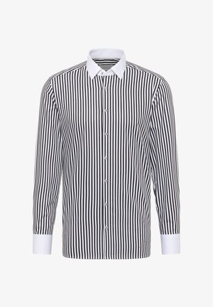 Chemise à manches longues avec des rayures verticales noires et blanches, devant boutonné et poignets contrastants blancs. Tissu en mélange de coton, col standard.