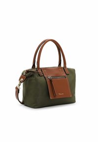 Sac à main vert olive avec poignées en cuir marron, poche avant zippée et bandoulière amovible, présenté sur un fond blanc.