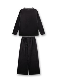 Black loungewear set featuring a long-sleeve top with a striped crew neckline and wide-leg pants, made of soft, textured fabric.