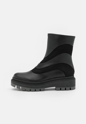 Platform ankle boots - black
