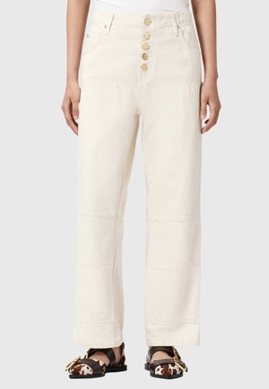 Wijde, gebroken witte spijkerbroek met vijfknoopssluiting aan de voorkant, opgestikte zakken en naadtoevoegingen. Gemaakt van licht gestructureerde stof.