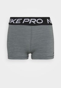 Gray athletic shorts made of a stretchy material. Features a black waistband with "NIKE PRO" printed in white and a small logo on the side.