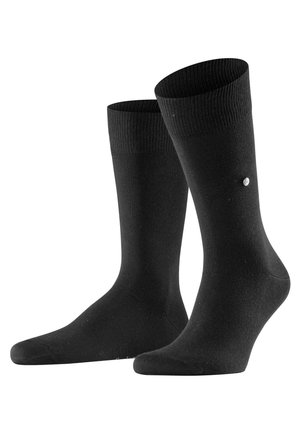 Chaussettes en coton noir avec une bordure ribbée et une texture lisse. Présente un petit logo près de la cheville. Design classique de chaussette.